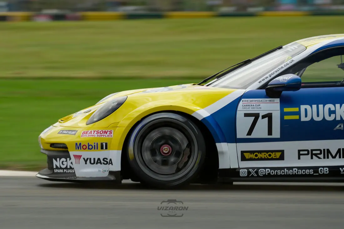 Yellow Porsche number 71 close-up